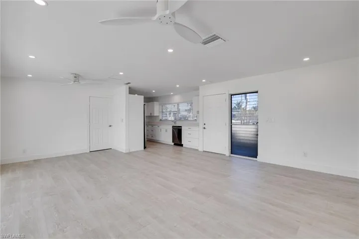 Unfurnished living room featuring recessed lighting, light wood-style floors, and ceiling fan
