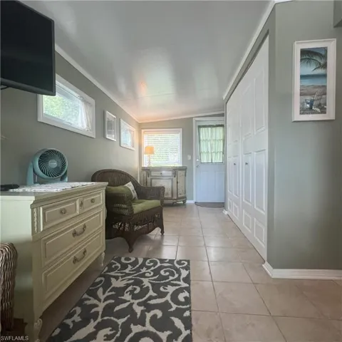 Florida Room with sitting area and TV