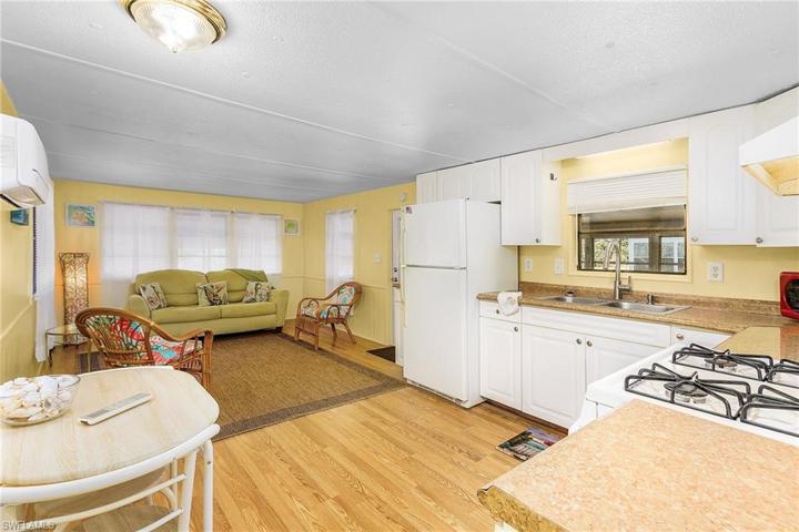 Livingroom opens to the kitchen.