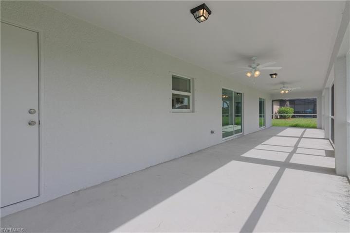 Guest bath exits onto screened lanai.