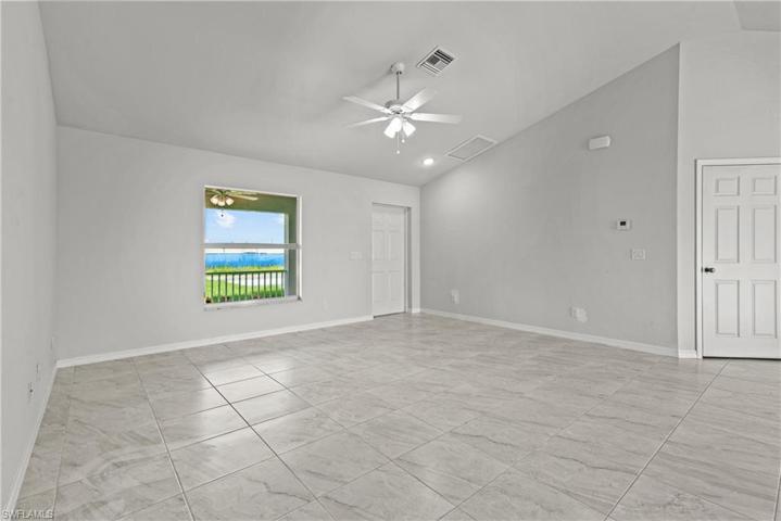 Pictured, front entry and great room.