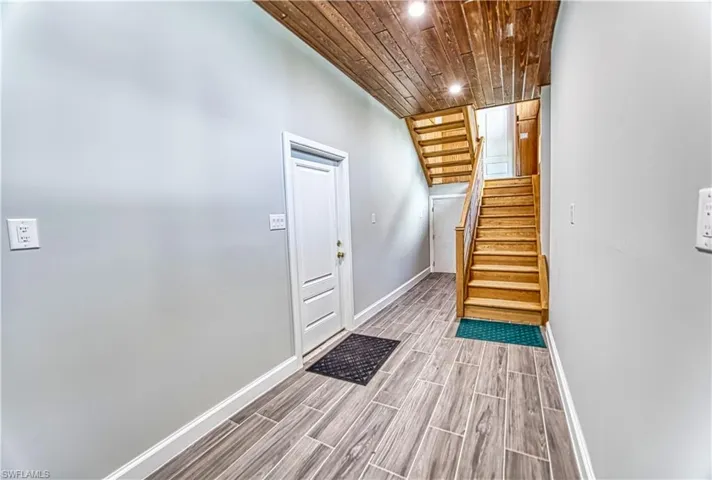 Lower Level Entry from Garage with Storage Closet