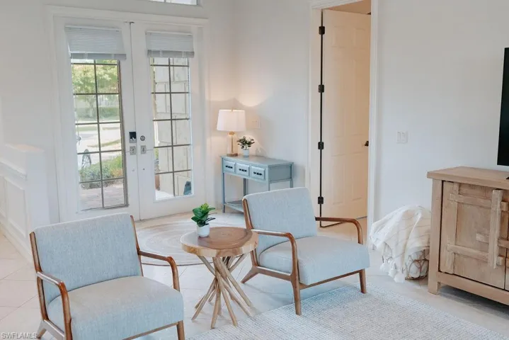 Front Living area with french doors and light tile patterned floors