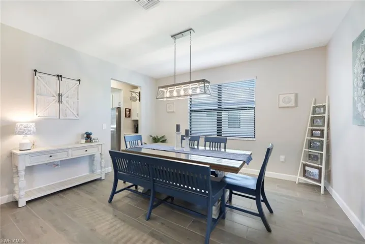 Dining space featuring hardwood / wood-style flooring