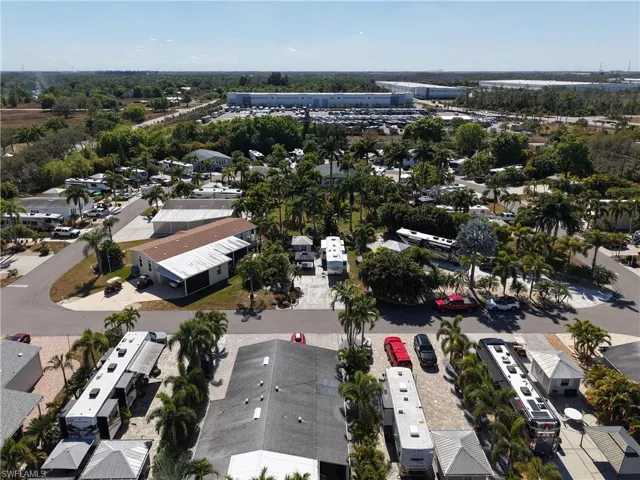 Aerial overview of property's location with nearby suburban area