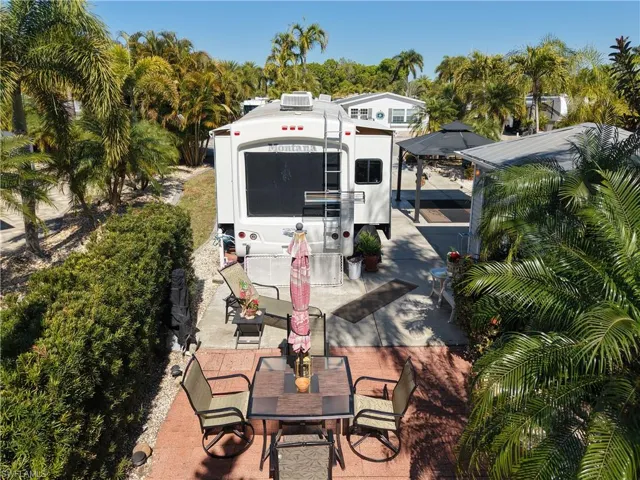 View of patio with outdoor dining area