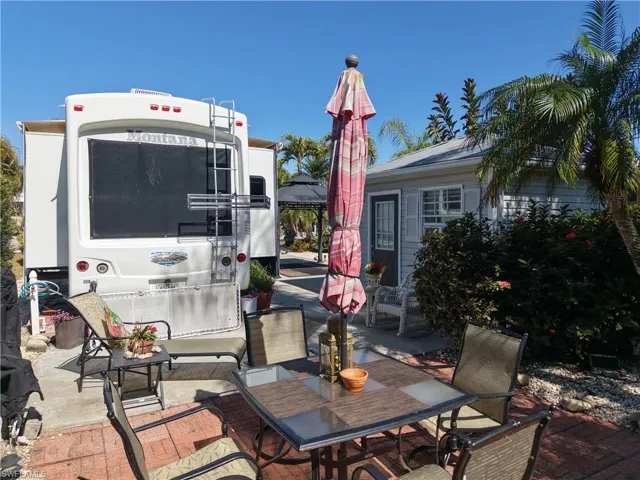 View of patio with outdoor dining space