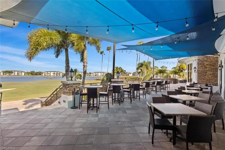 Outdoor patio dining at the Grille Room overlooks the golf course with stunning sunset views