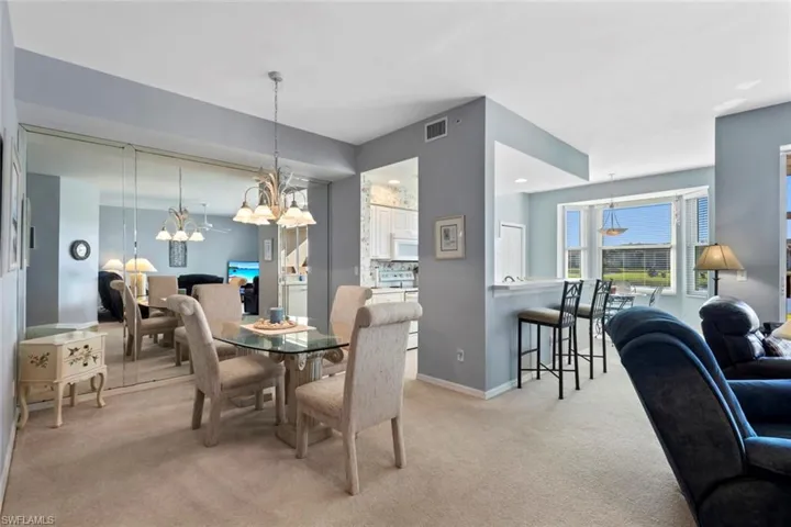 Dining room with entrance to kitchen and great room across