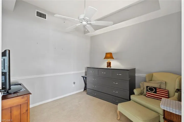 The Den is located on the left as you pass the Guest Bedroom and bathroom.  The Murphy bed conveys with the condo.