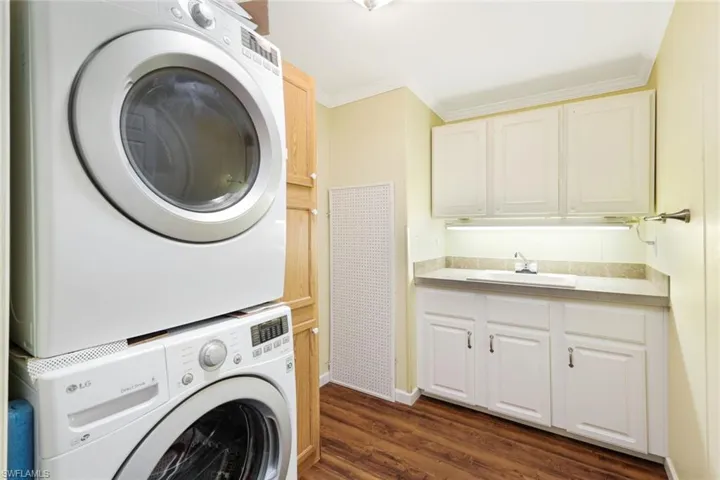 Laundry Room with Sink and Cabinets