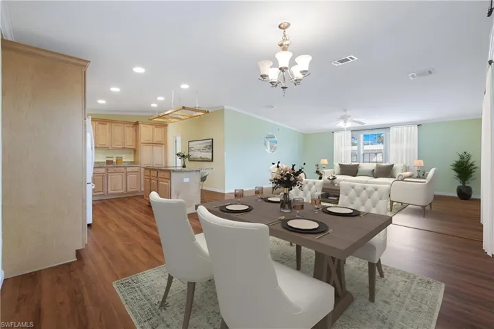 Virtually Staged - Dining area open to kitchen and Great Room