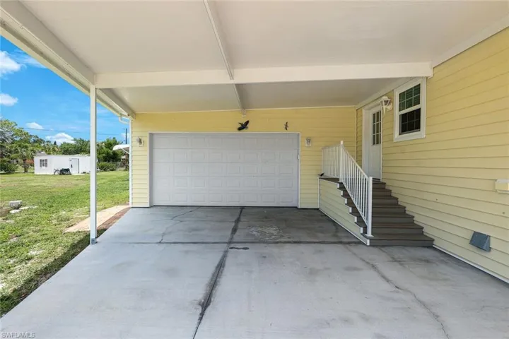2 Car Garage with covered carport