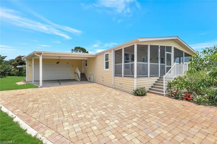 Covered Carport and 2 car garage