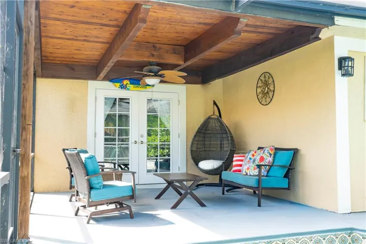 View of patio / terrace with a ceiling fan and french doors