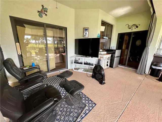 Screened Lanai- Covered porch.