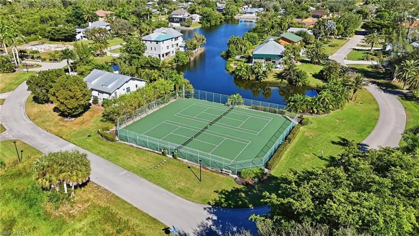 Aerial view of residential area with a nearby body of water