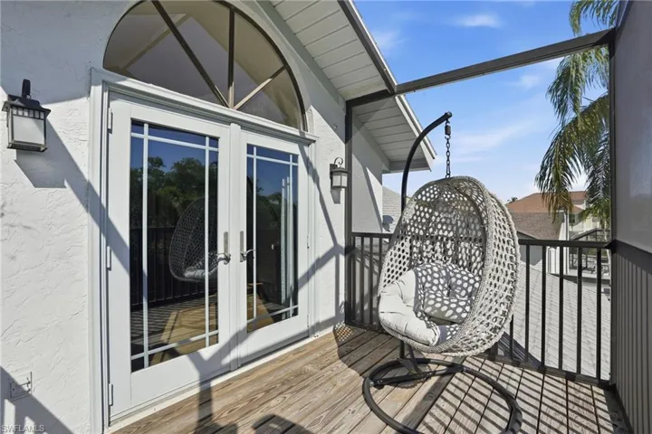 Wooden terrace with french doors