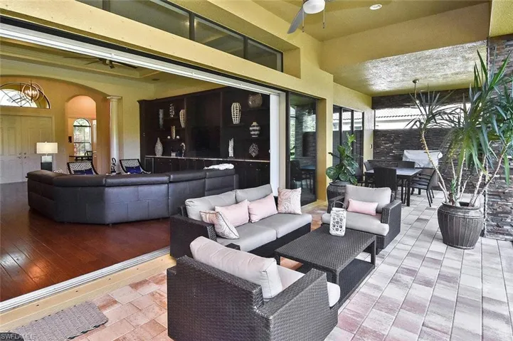 View of patio / terrace featuring an outdoor hangout area, outdoor dining area, and ceiling fan