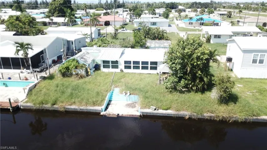 Aerial view from canal rear of lot