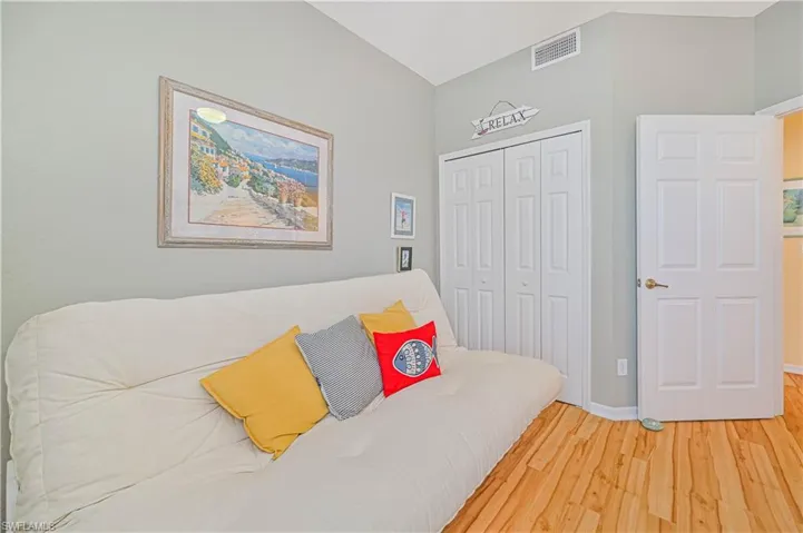 Bedroom featuring a closet and light hardwood / wood-style floors