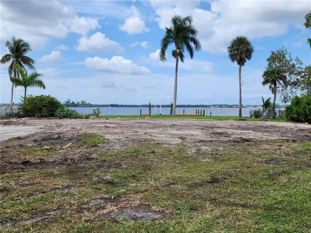View of yard with a water view