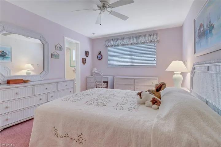 Bedroom featuring carpet flooring and ceiling fan