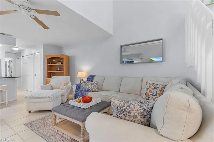 Tiled living room with ceiling fan