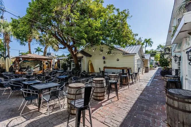 View of patio featuring a bar