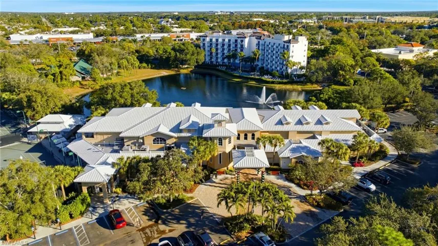 Aerial view of a large body of water and a tree filled landscape