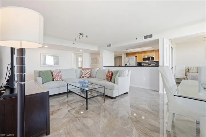 Living room with light marble finish floors