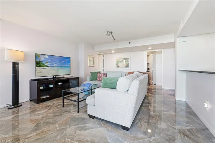 Living room with light marble finish floors
