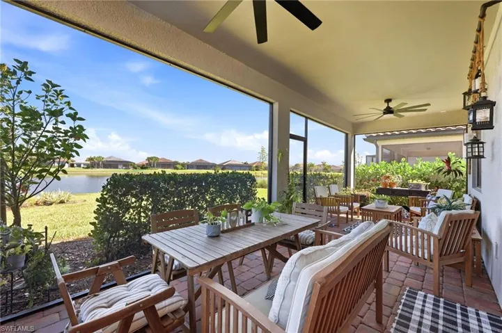 Screened patio lanai furniture included with home.