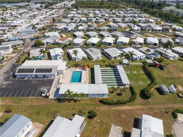 Aerial overview of property's location with nearby suburban area