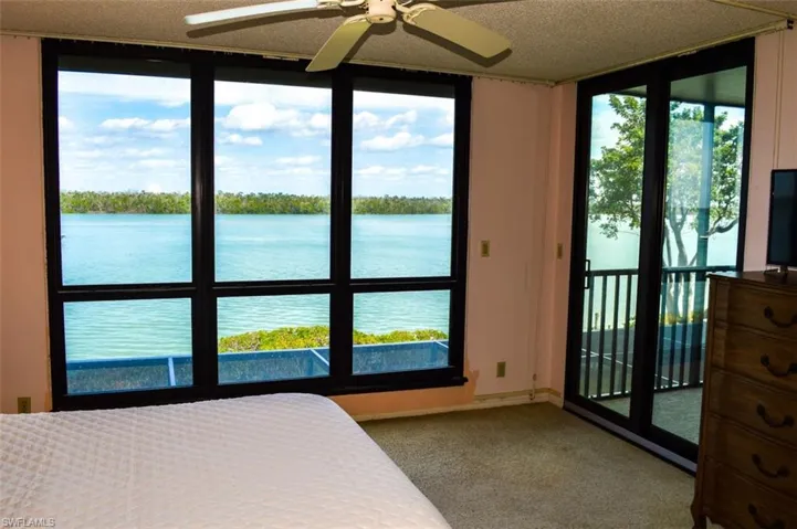 OWNER'S SUITE ESTERO BAY VIEWS.  ENTRANCE TO LANAI SHOWN AT RIGHT.