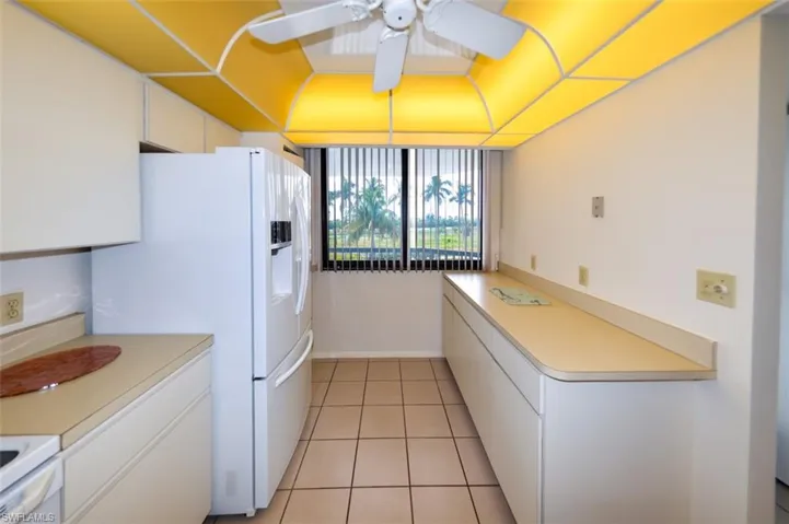 KITCHEN WITH SOUTHERN EXPOSURE WINDOW