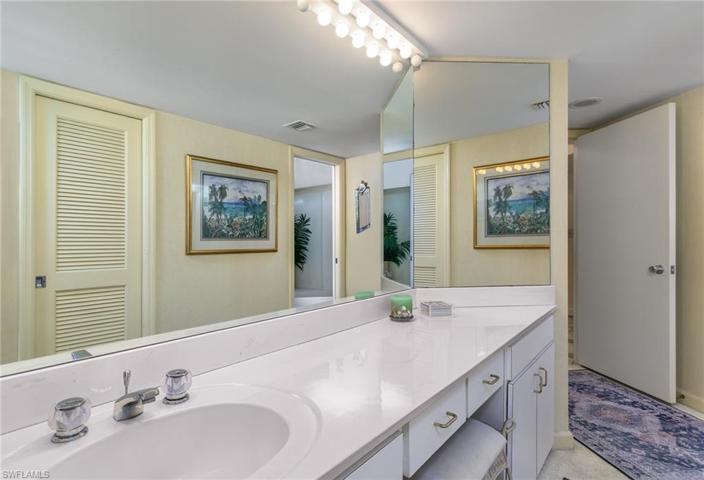 Primary Suite with Vanity and Separate Bath and Shower in adjacent Room