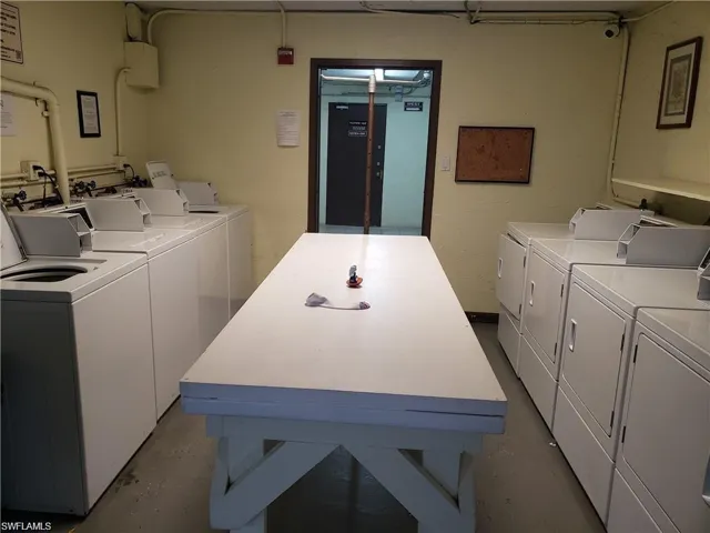 Washroom featuring separate washer and dryer