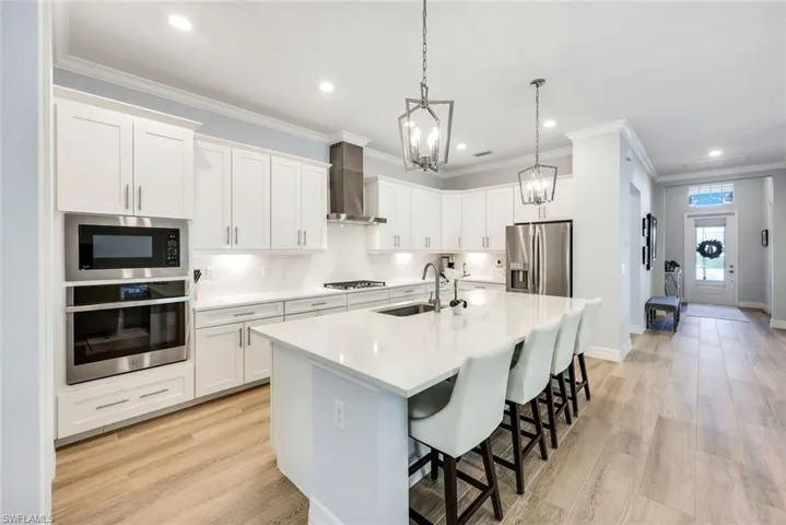 The wood-look tile flooring extends throughout the home.