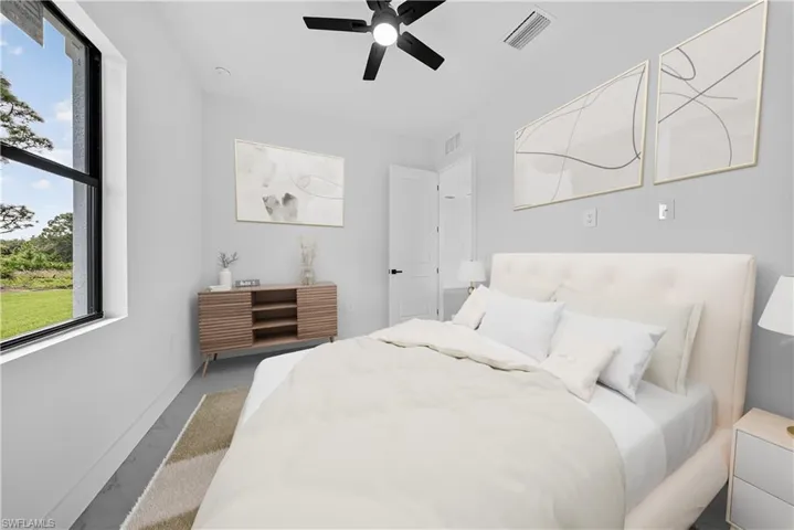 Bedroom with baseboards and a ceiling fan