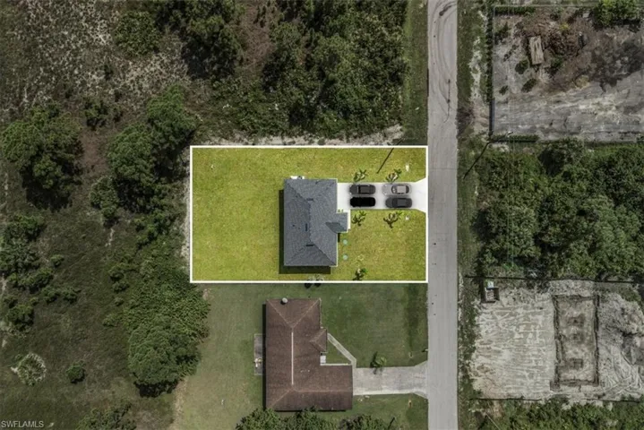 Aerial view of property's location featuring property parcel outlined