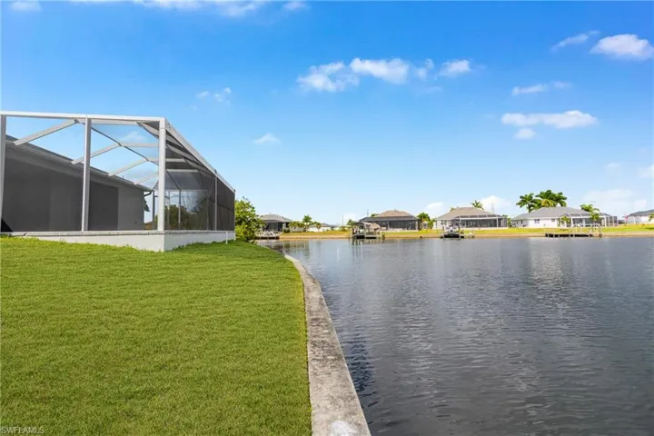 Water view with nearby suburban area