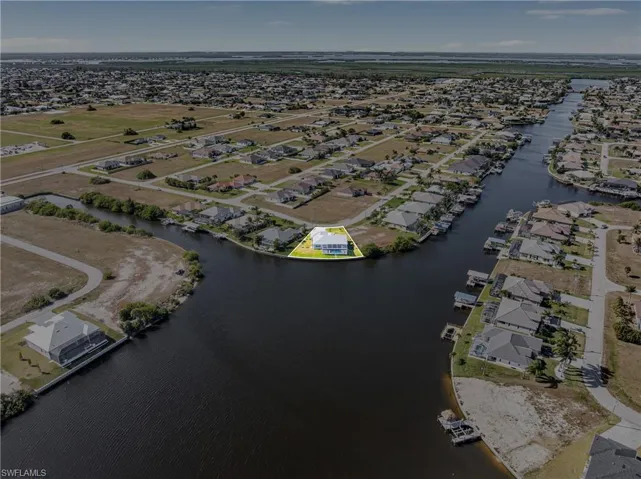 Aerial overview of property's location with nearby suburban area
