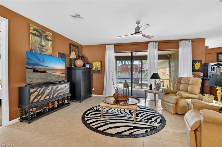 Great room with sliders to screened lanai