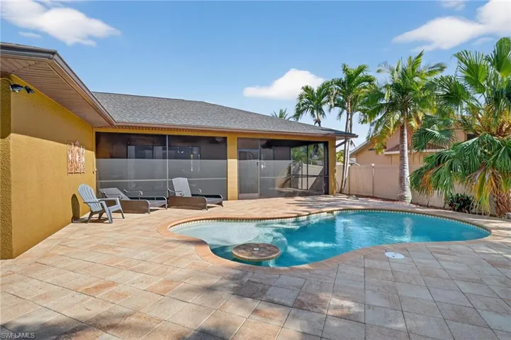 Saltwater pool with swim up bar