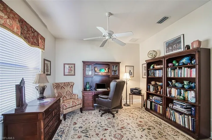Home office featuring ceiling fan