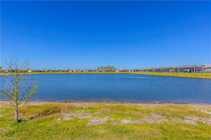 Property view of water with a residential view