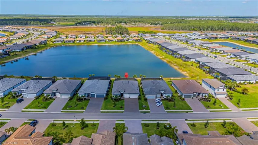 Aerial view with a residential view and a water view