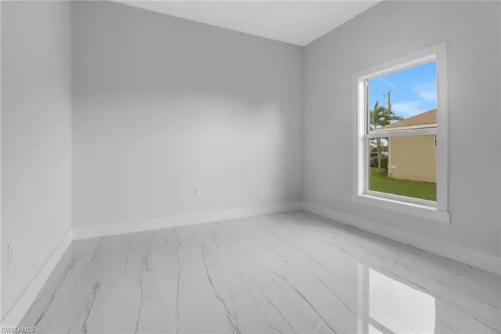 Spare room featuring light hardwood / wood-style floors