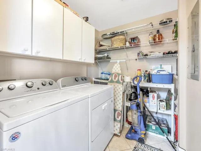 Laundry room with built in cabinets